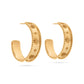 Capucine De Wulf - Berry Hoop Earrings in Hammered Gold